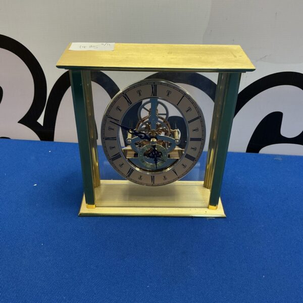 Elegant modern quartz mantle clock on display.