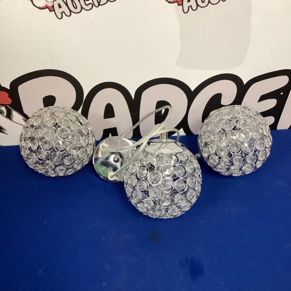 Modern three ball ceiling light with chrome finish.