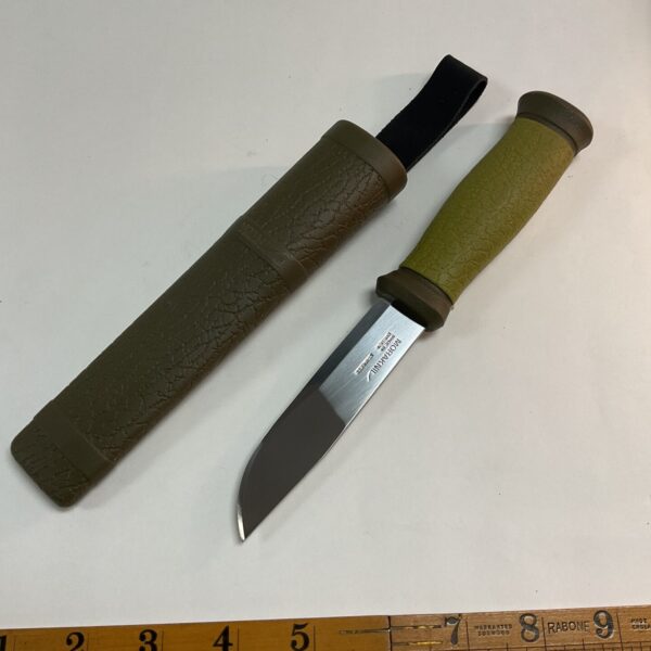 Vintage Swedish Morakniv fishing knife with leather sheath.