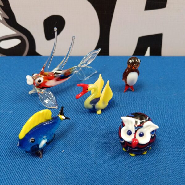 Set of five colourful Murano glass animals including an owl and fish.