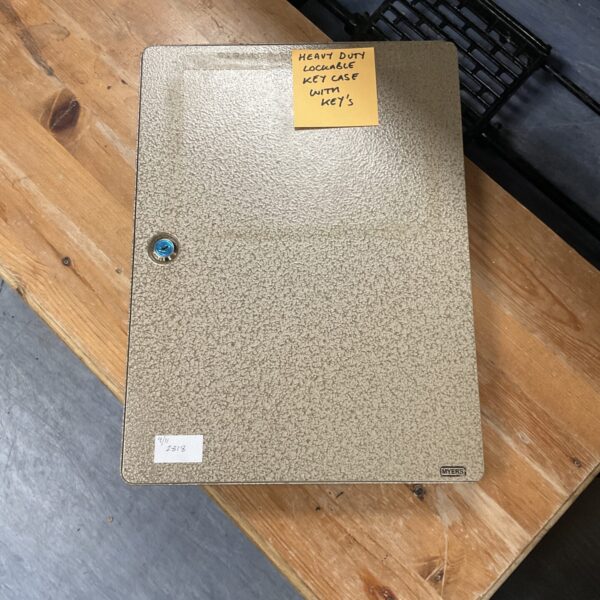Vintage Myers heavy duty key cabinet for secure key storage.