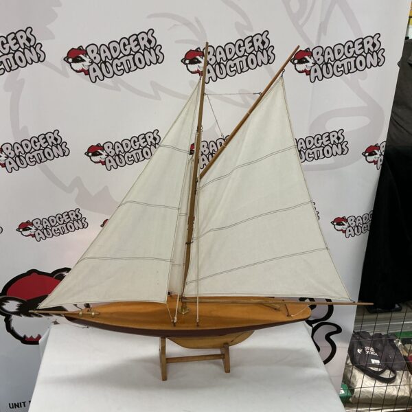 Vintage Nauticalia of London model yacht with cloth sail.