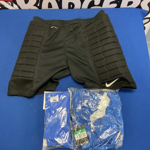 Blue Nike football shorts with padding for sports performance.
