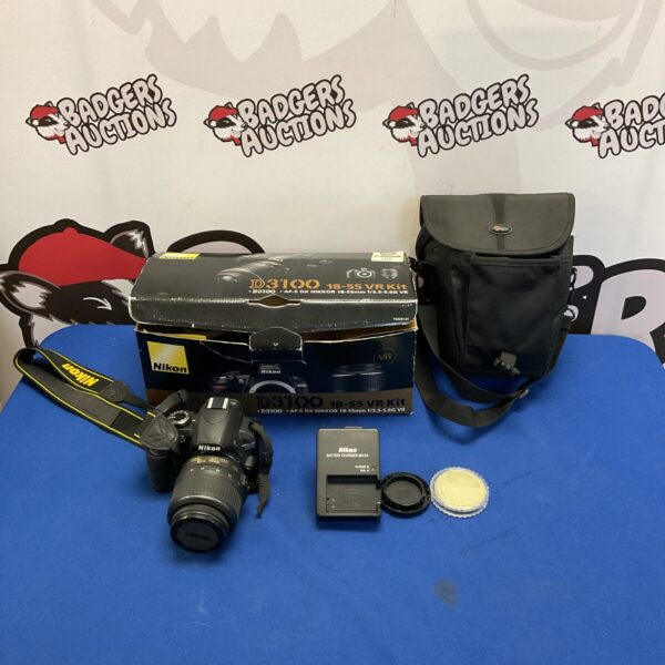 Nikon D3100 camera kit with 18-55mm lens for digital photography.