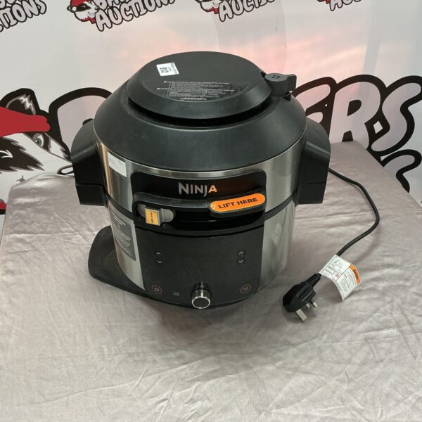 Front view of a black Ninja pressure cooker kitchen appliance.