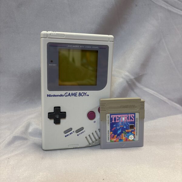 Vintage Nintendo Game Boy console with Tetris cartridge displayed.