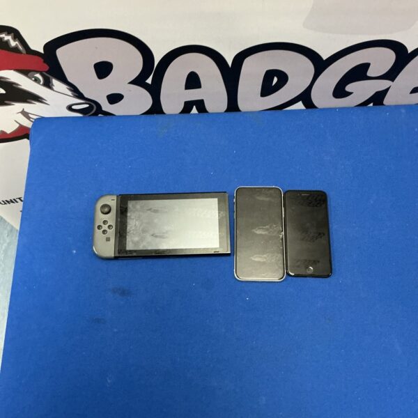 Front view of a grey Nintendo Switch console.