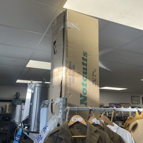 Boxed Notcutts artificial Christmas tree for festive holiday decoration.