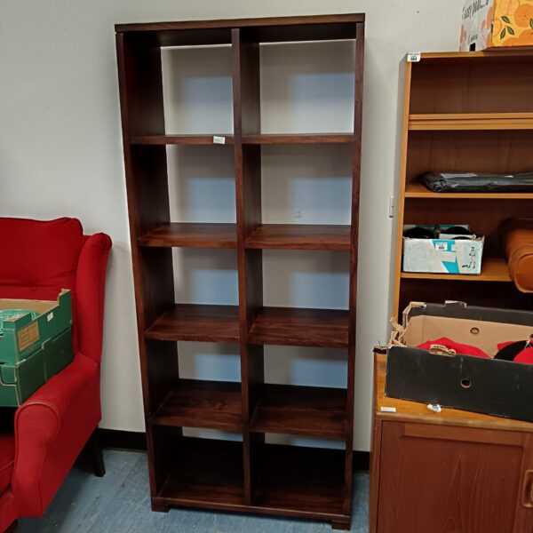 Large oak cube storage unit for books and display.