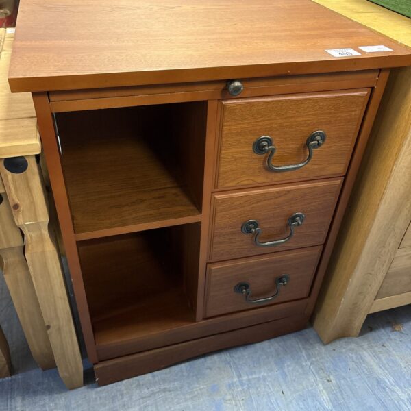 Vintage oak multi-drawer cabinet with multiple drawers for storage.
