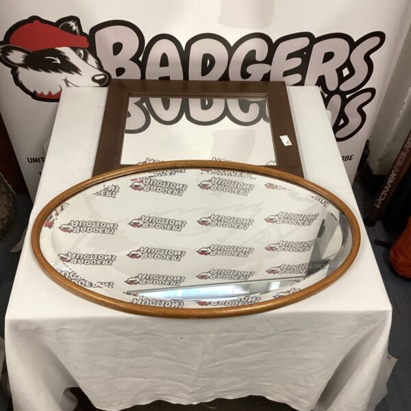 Vintage oval wall mirror for home decor.