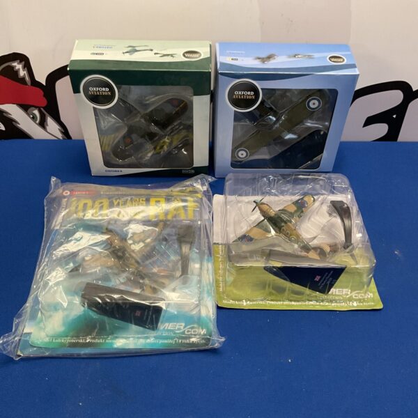 Lot of four Oxford Aviation fighter plane models in boxes.