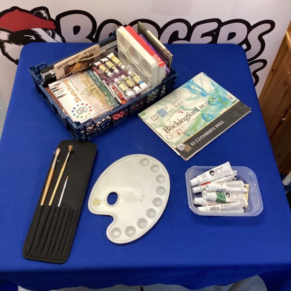 Mixed lot of painting art supplies with paints and printing blocks.