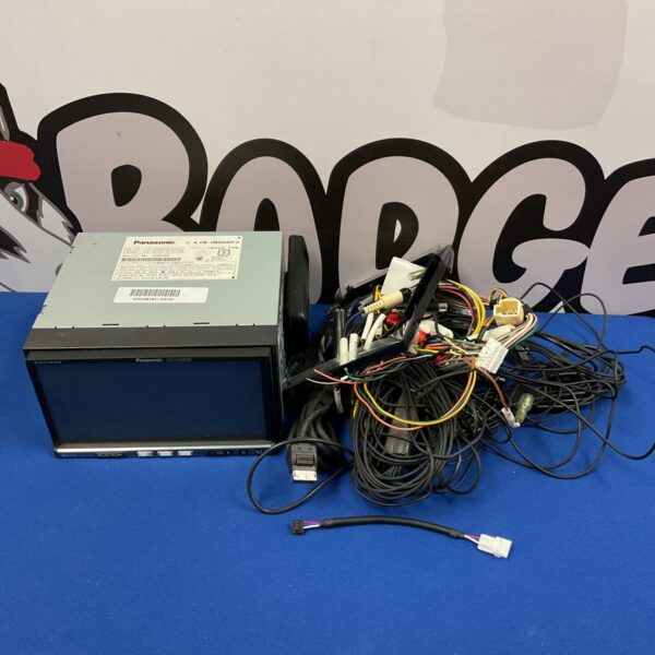 Panasonic Strada CN-HW880D car stereo with wiring harness.
