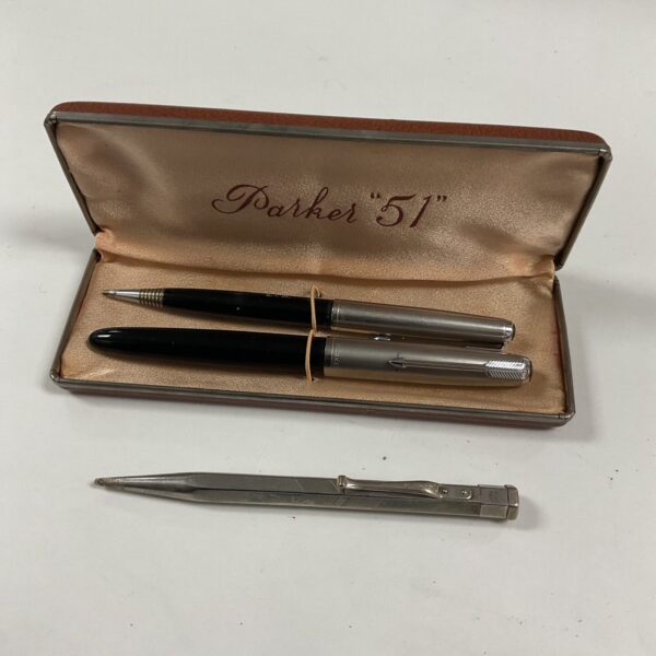 Vintage Parker 51 pen and pencil set in original packaging.