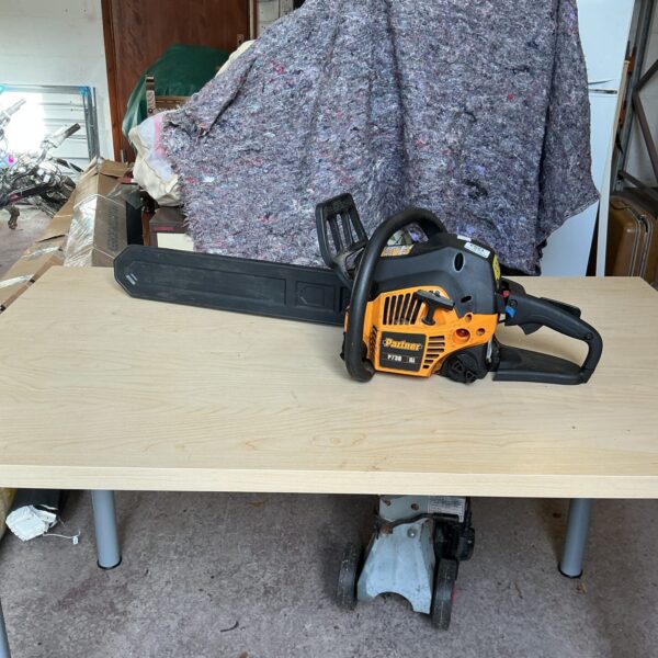 Vintage Partner P738 petrol chainsaw for garden and forestry work.