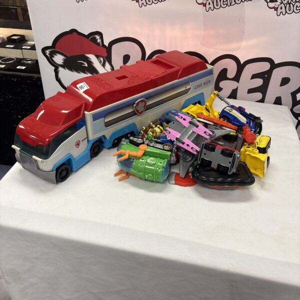 Paw Patrol toy bundle with Patroller vehicle and character figures.
