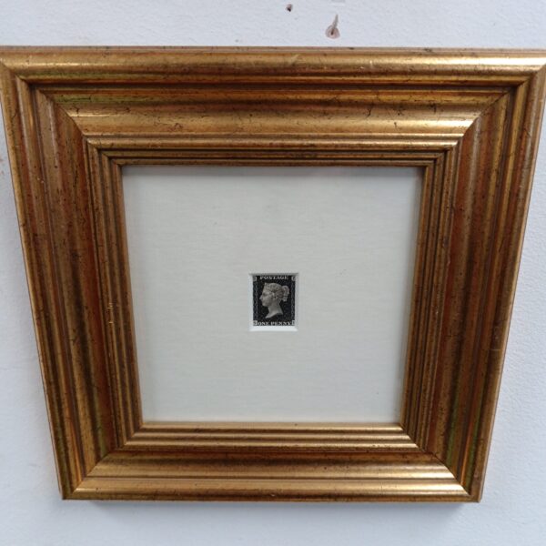 Gilt framed engraving of the iconic Penny Black stamp.