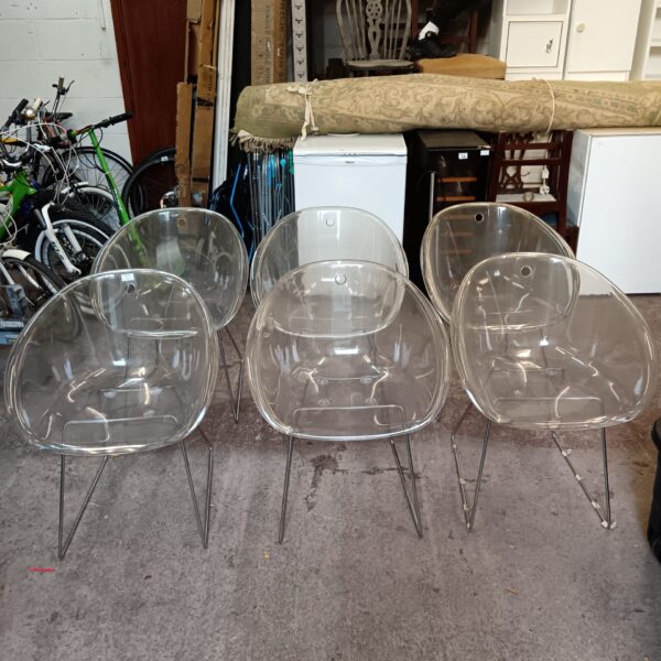 Clear perspex chairs set, modern design seating.