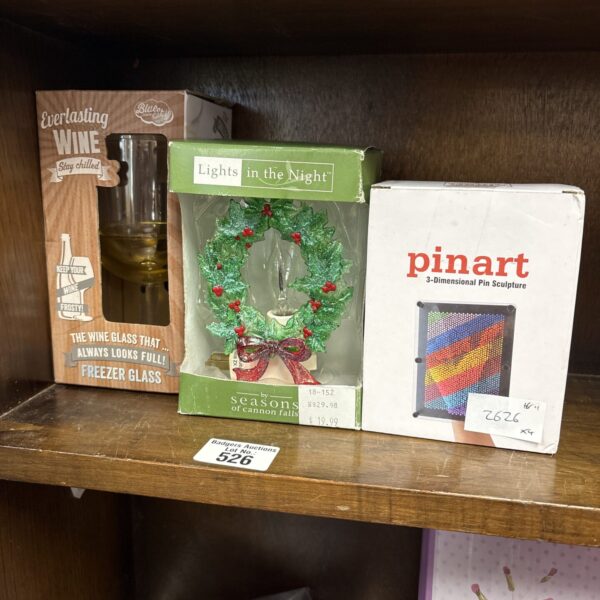 Pinart 3D sculpture with wine glass and Christmas ornament.