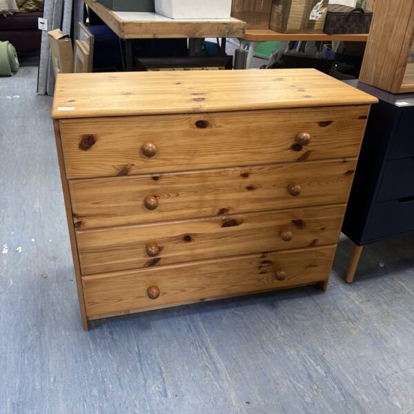 Vintage solid pine chest of drawers with four drawers.