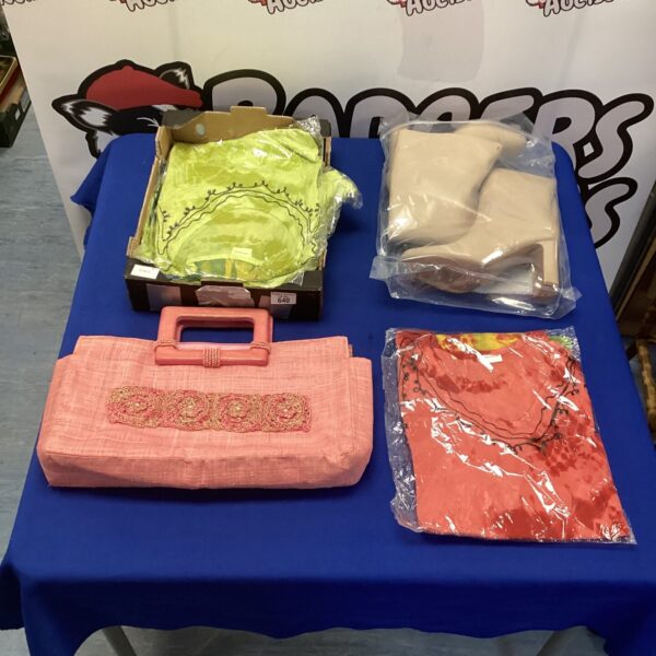 Vintage pink handbag, a classic ladies fashion accessory.