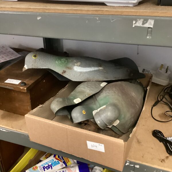 Vintage plastic pigeon decoys for hunting and collecting.