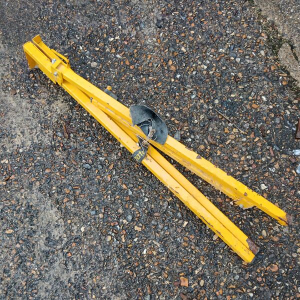 Metal plumbers pipe stand for workshop support and cutting.