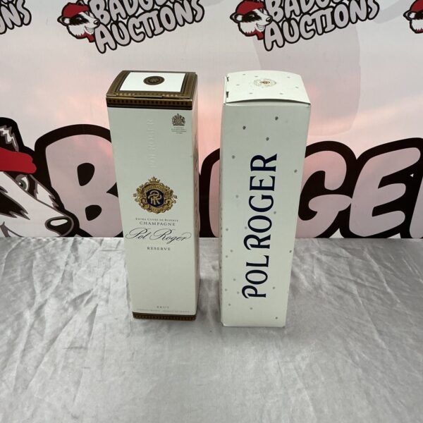 Two bottles of Pol Roger Champagne presented for auction.