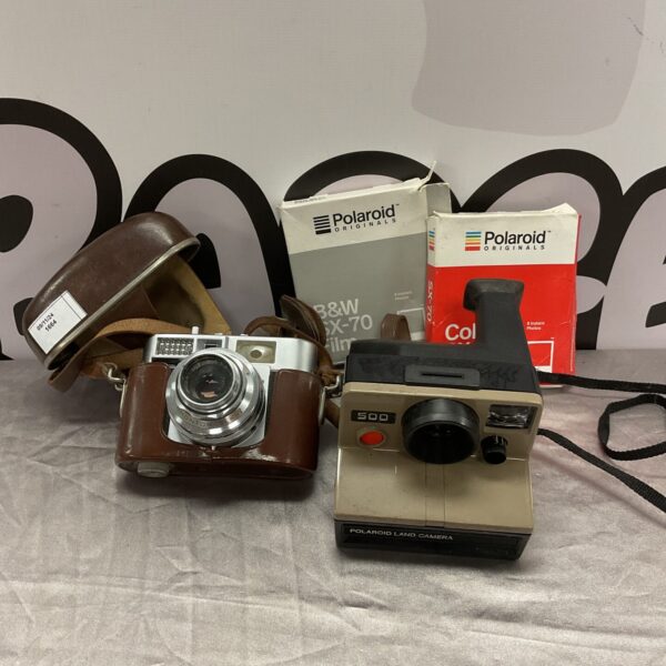 Vintage Polaroid 500 Land Camera and Voigtlander Vitomatic II with film.