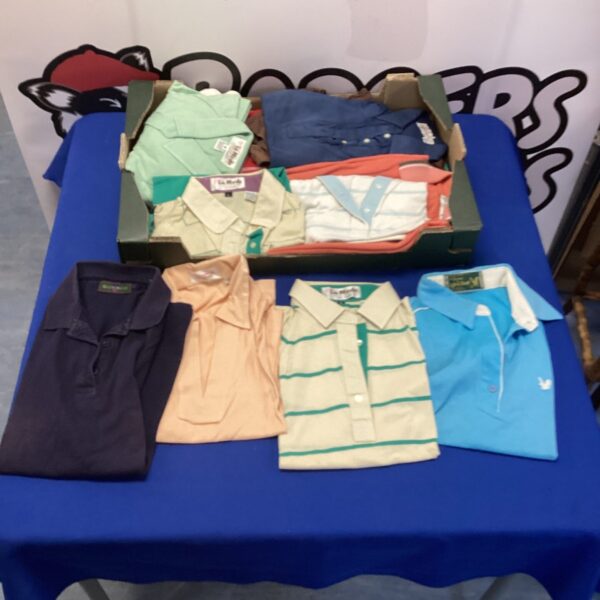 Mixed lot of assorted polo shirts for casual wear.