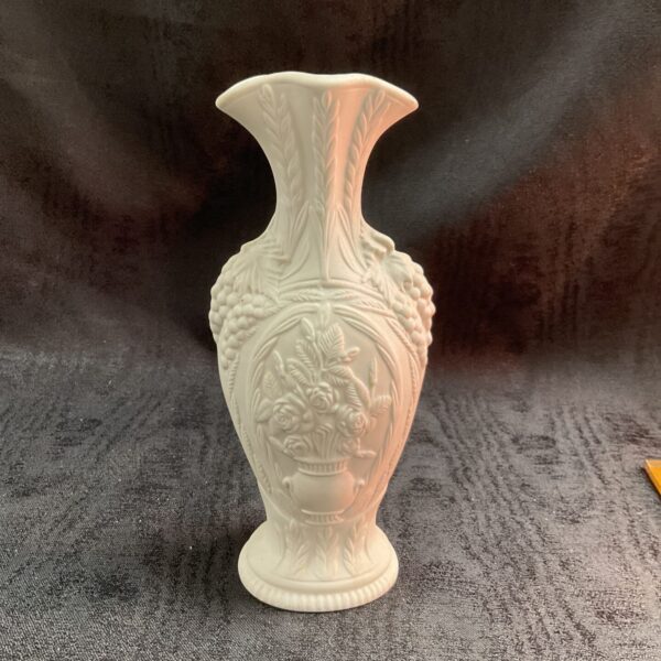 Detailed Portmeirion parian porcelain vase with floral design.