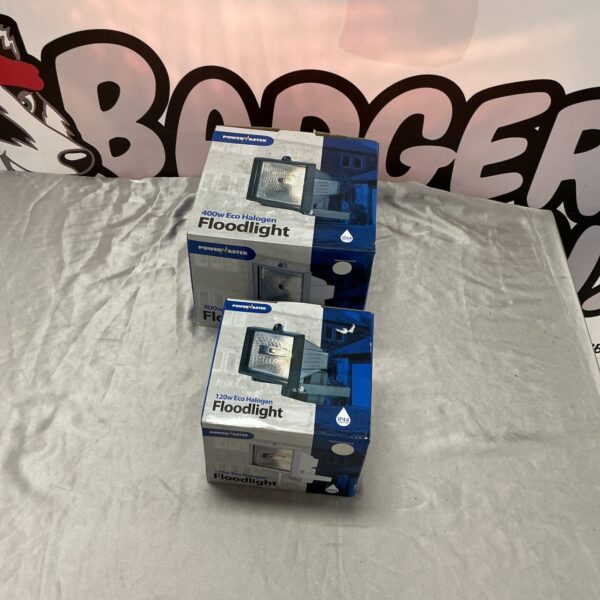 Pair of used Power Master halogen floodlights for outdoor work.