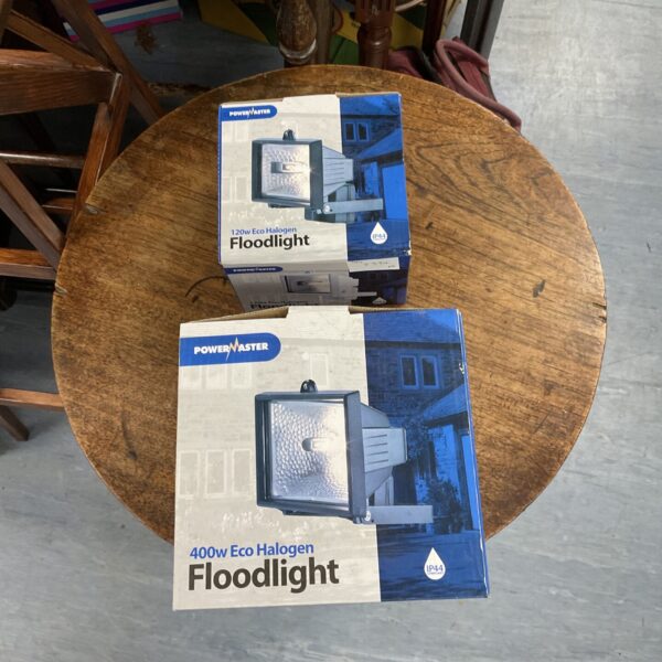 Powermaster halogen floodlight in original packaging, new condition.