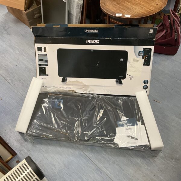 Unused Princess electric glass panel heater still in its original box.