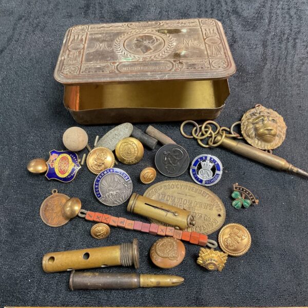 Antique Princess Mary Gift Tin with military band inside.