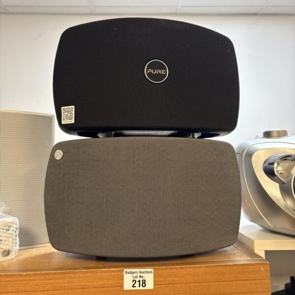Pair of Pure Jango T4 wireless Bluetooth speakers in used condition.