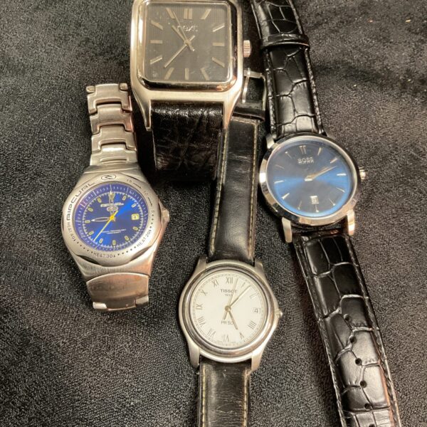 Lot of four quartz wristwatches including Next brand.