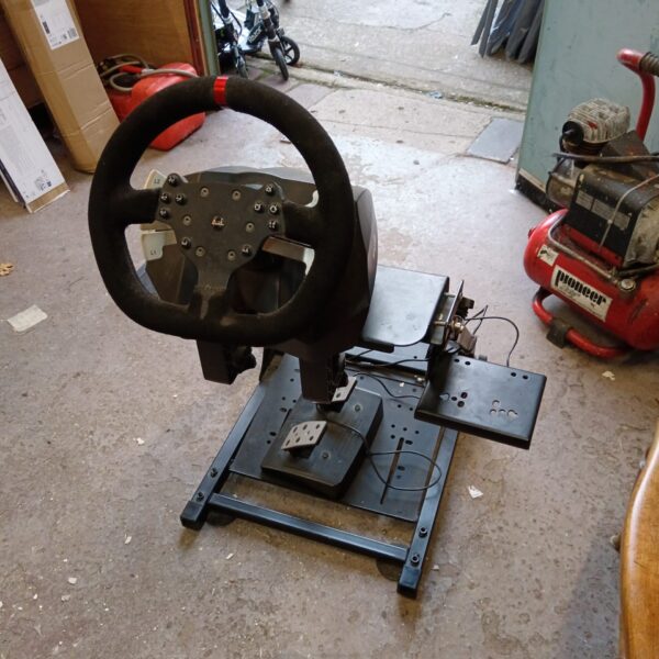 Used racing steering wheel for gaming and driving simulators.