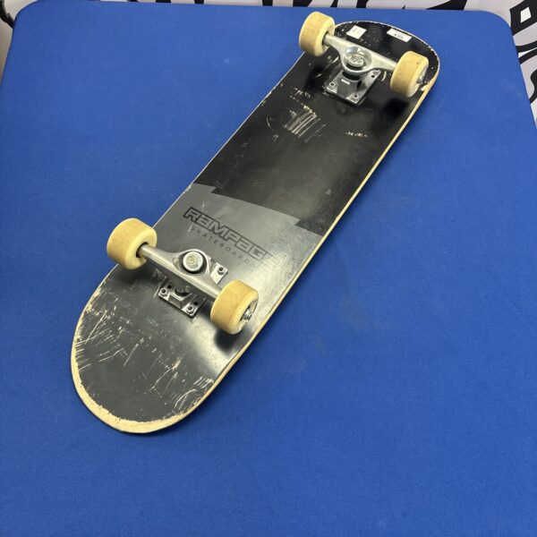 Used Rampage skateboard with graphic deck and wheels.