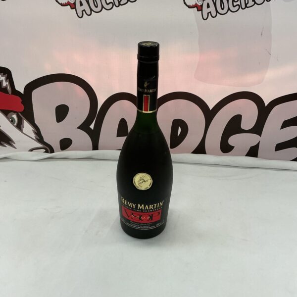 Remy Martin VSOP Cognac bottle, vintage French brandy collectible.