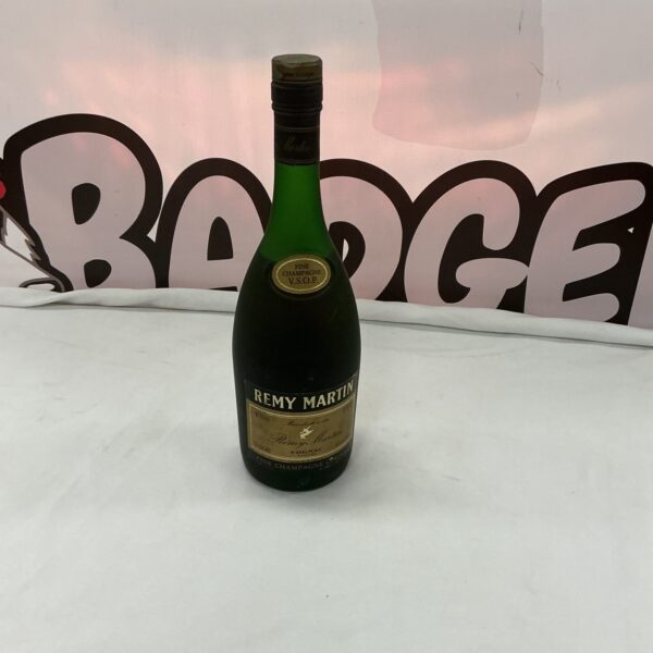 Vintage Remy Martin Cognac bottle with classic branding.