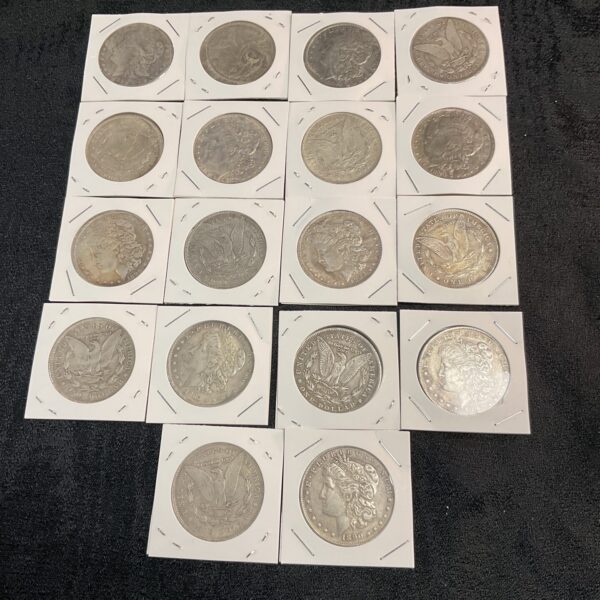 Lot of eighteen reproduction American dollar coins for collectors.