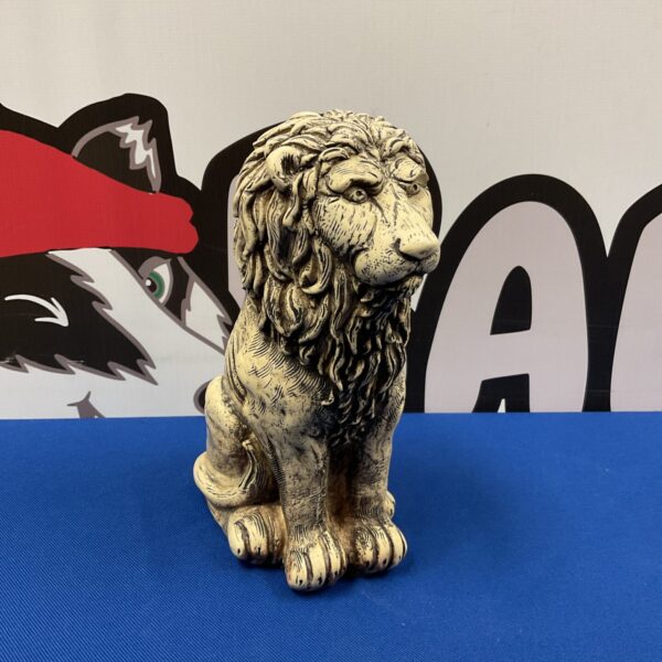 Detailed resin lion ornament for home decor.