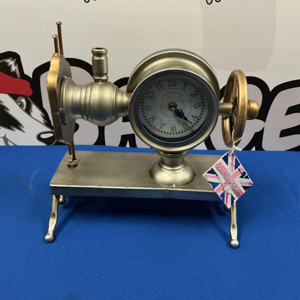 Vintage retro sewing machine clock for home decor.