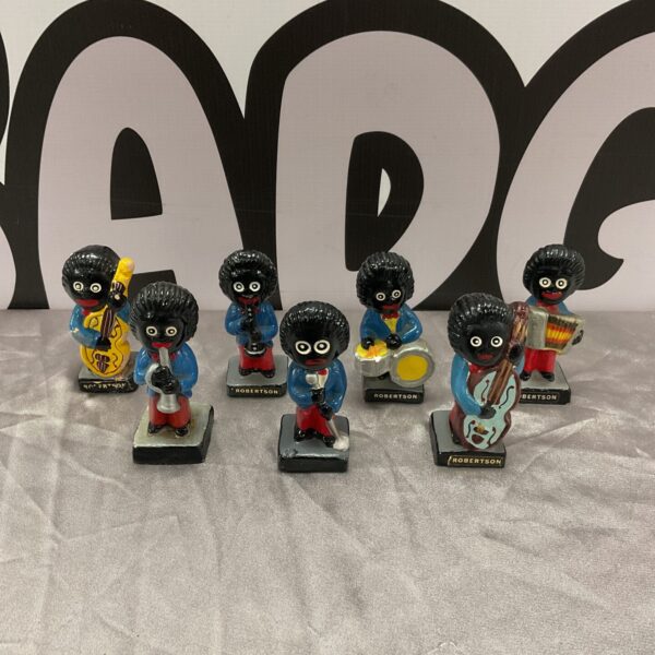 Vintage Robertson Golly band figures, collectible plaster toys.