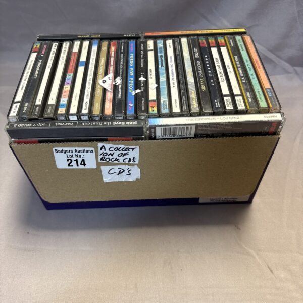 Lot of vintage rock music CDs for collectors.