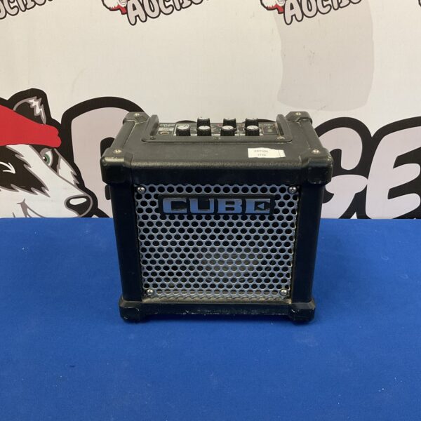 Roland Micro Cube GX amplifier, portable guitar amp for practice.