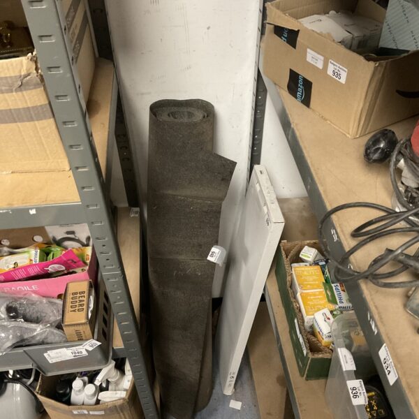 Black roofing felt roll for waterproofing and construction projects.