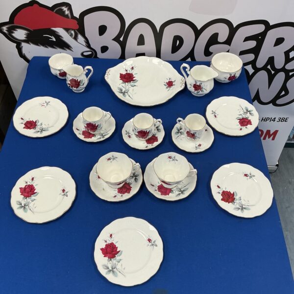 Royal Albert Sweet Romance bone china tea set with floral design.